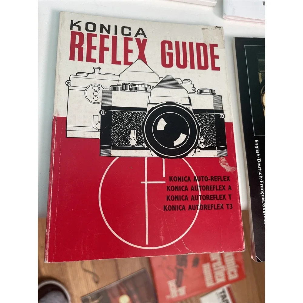 Lot of 6 vintage nikon , konica camera's manuals (8?)